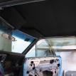 Installed headliner with matching sun visors